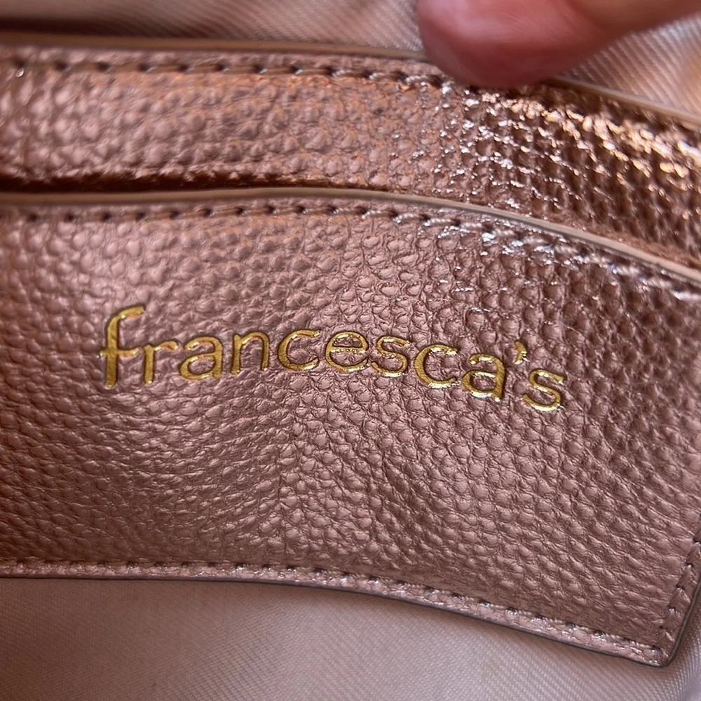 Francesca’s Rose Gold Clutch Wristlet